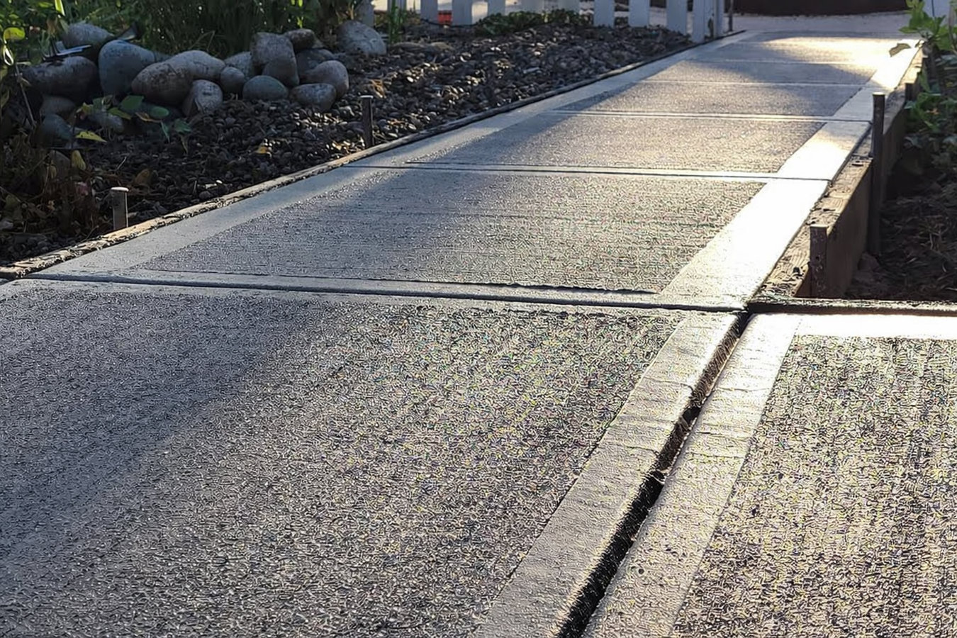 Concrete sidewalk building in Somerville, MA