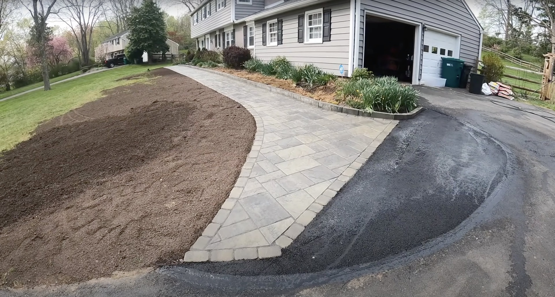 Professional Concrete Driveway Installation Services Concrete driveway construction showing professional installation and paving process
