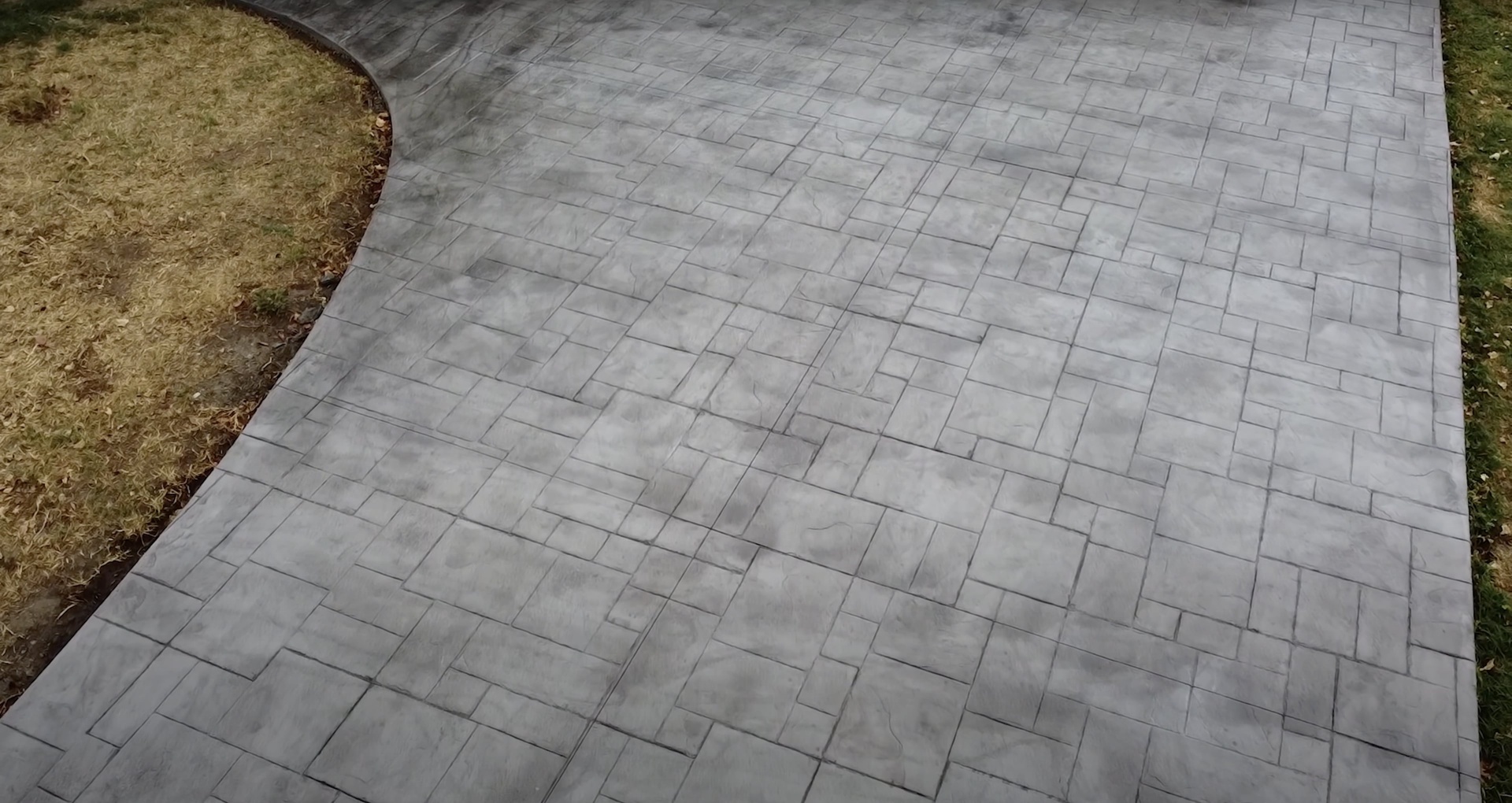 Stamped Concrete Patio - Ashlar Slate Pattern Design Beautiful stamped concrete patio with ashlar slate pattern showing professional installation