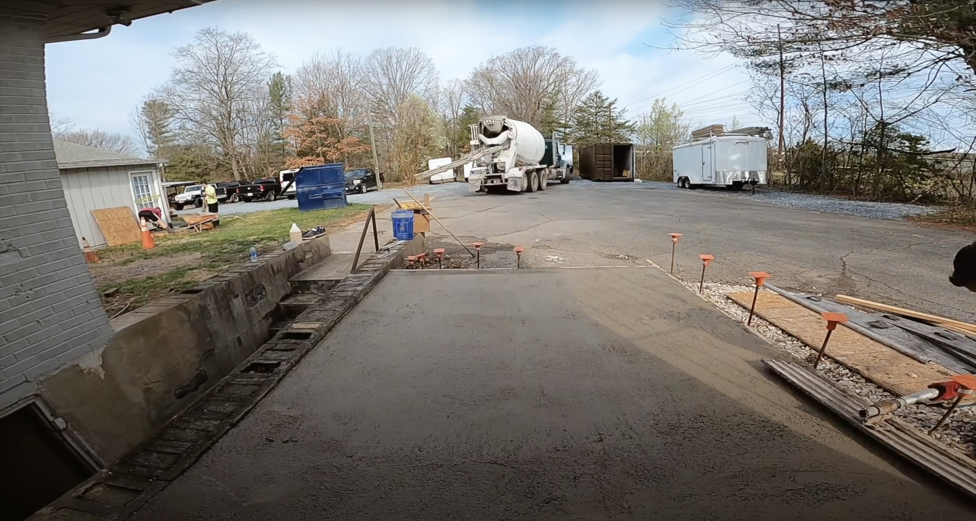 Commercial Concrete Foundation Installation Process Commercial concrete foundation pour in progress with concrete truck and professional equipment